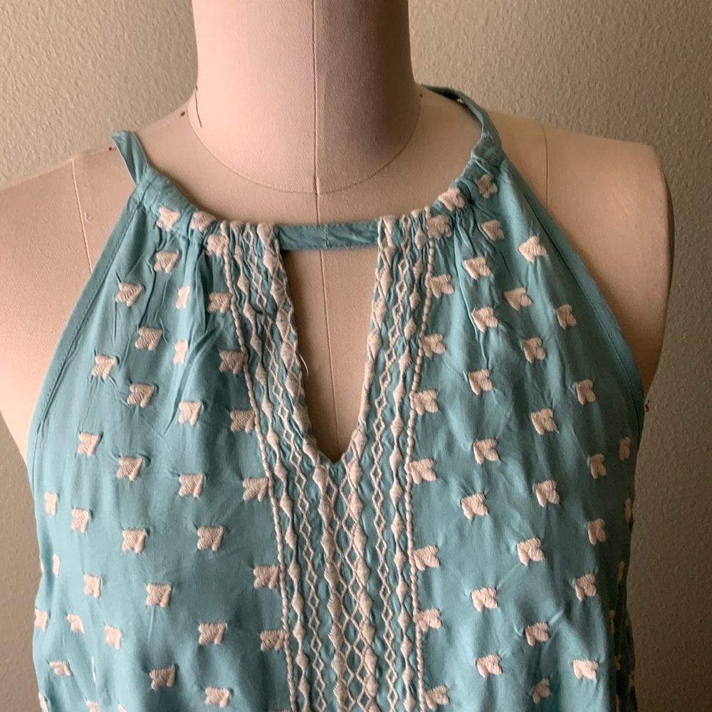 Sundance, seafoam color with embroidery accents. Sleeveless/Halter style top.